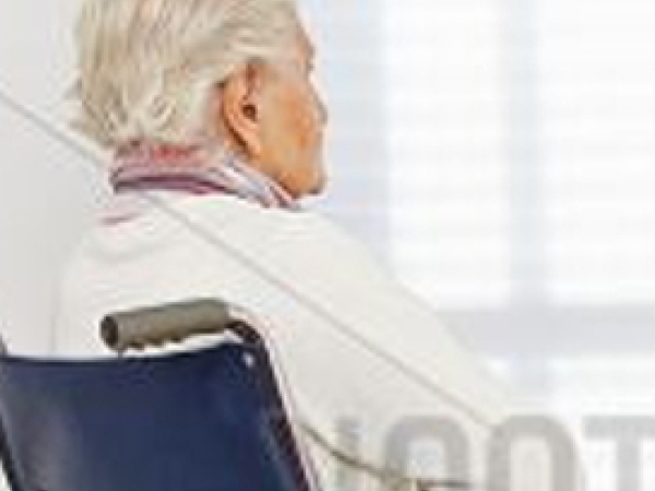 woman in wheelchair image